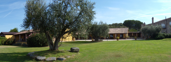 view of farmhouse and apartments